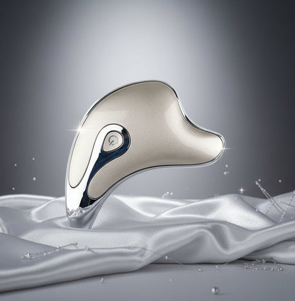 Ergonomic silver handheld electric massager with power button on white background