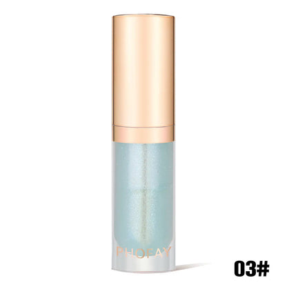 lip oil bottle with gold cap and light blue body on a white background