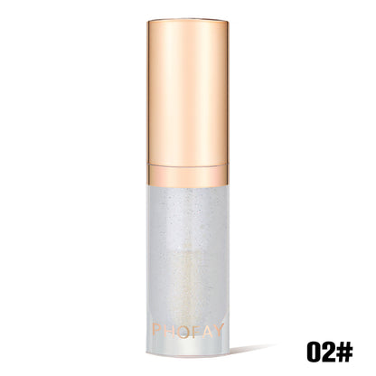 lip oil bottle with gold cap and gray body on a white background