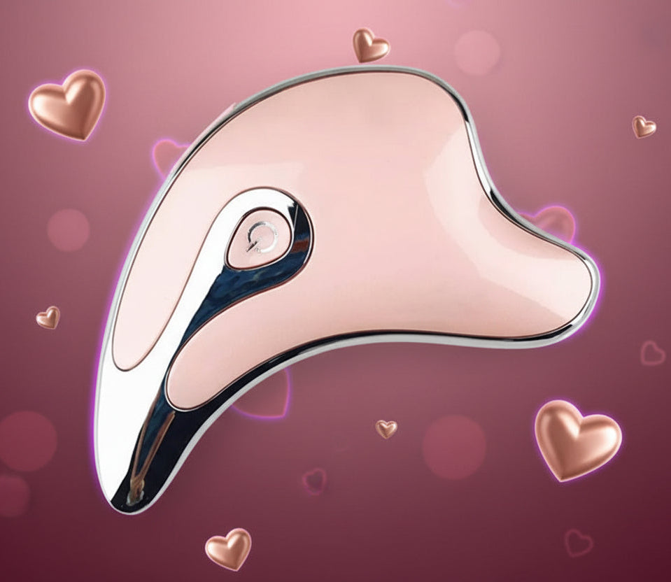 Pink and silver handheld facial massage tool with ergonomic dolphin shape