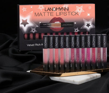 Langmanni matte lipstick collection with swatches on arm showing rich velvet colors and smooth finish