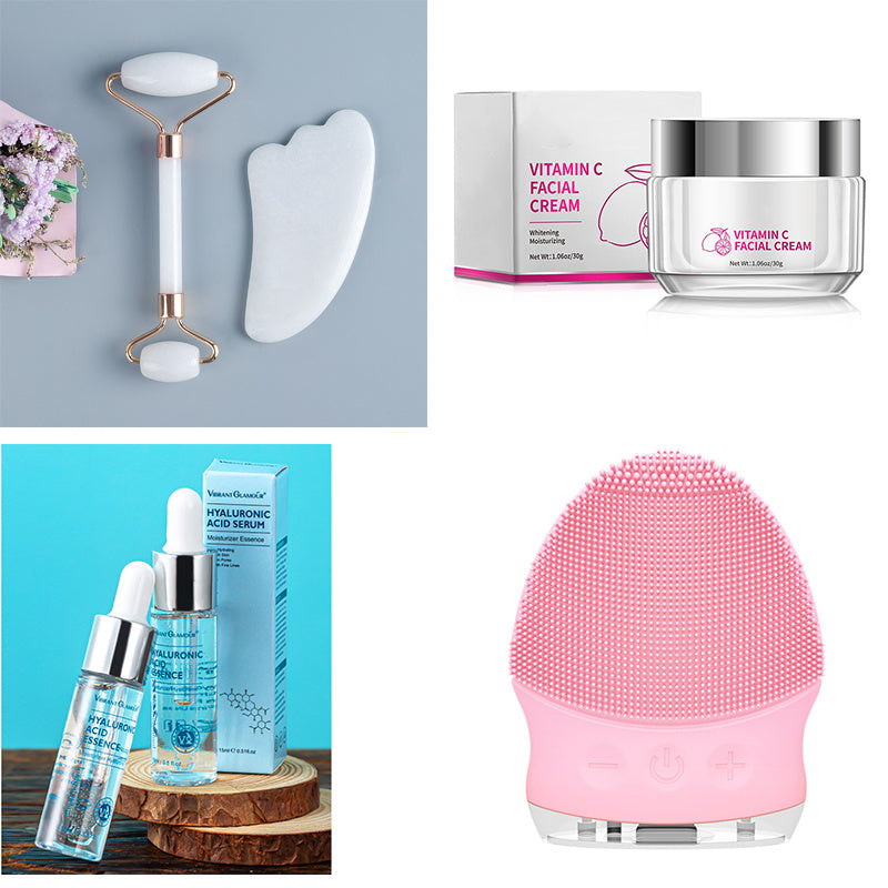 Vitamin C facial cream, hyaluronic acid serum bottles, white jade roller and gua sha, pink silicone facial cleanser