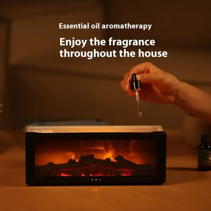 Hand using a dropper over an electric fireplace with text about essential oil aromatherapy.